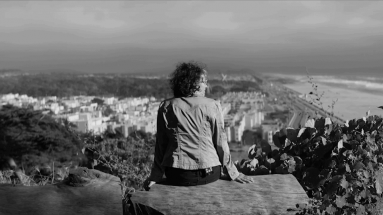 Image of Woman Looking Over City