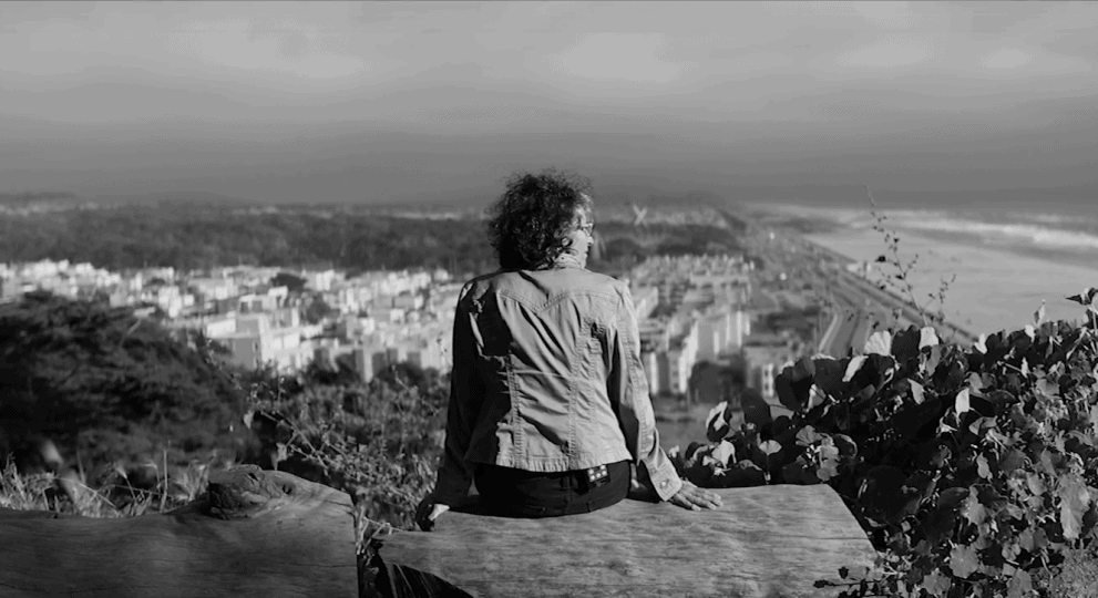 Image of Woman Looking Over City